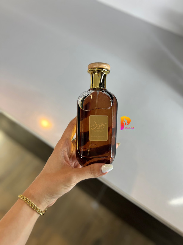عطر ادکلن موصوف قهوه ای ارض الزعفران